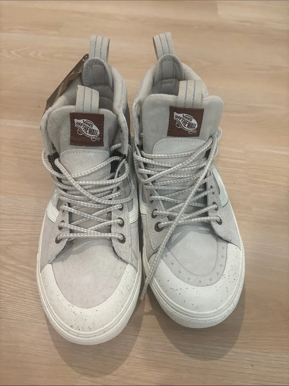 Vans women’s8.5/mens 7 High-Top Suede Sneakers in Light Gray and White